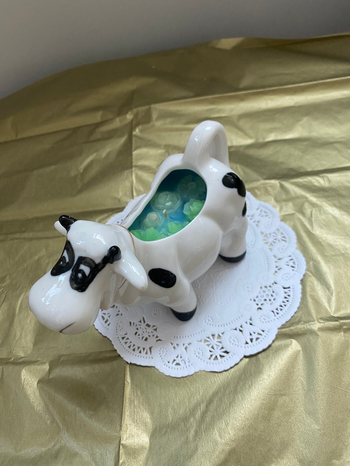 Ceramic cow candle